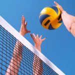 hands up the net to block volleyball spike